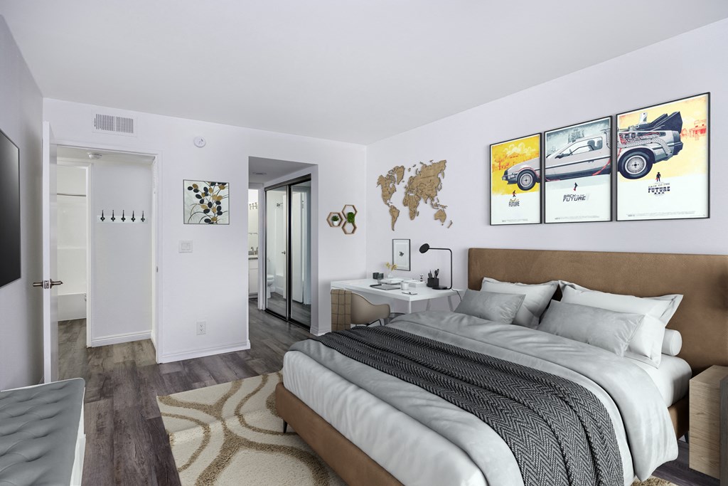 A bedroom with a large bed and a world map on the wall.