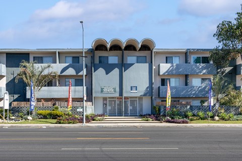 a large building with a street in front of it