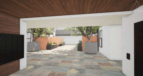 a hallway with white walls and a wooden ceiling