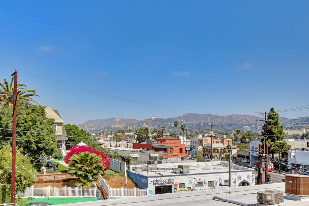 a view of the city from the roof of a building