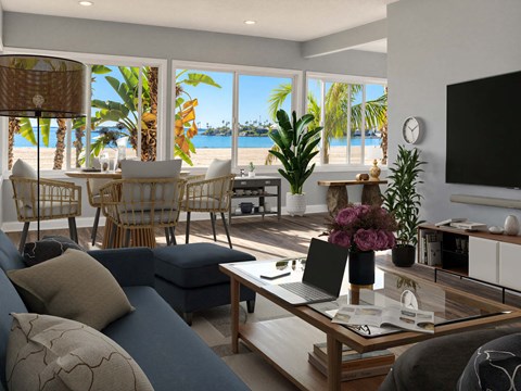 A modern living room with a view of the beach.