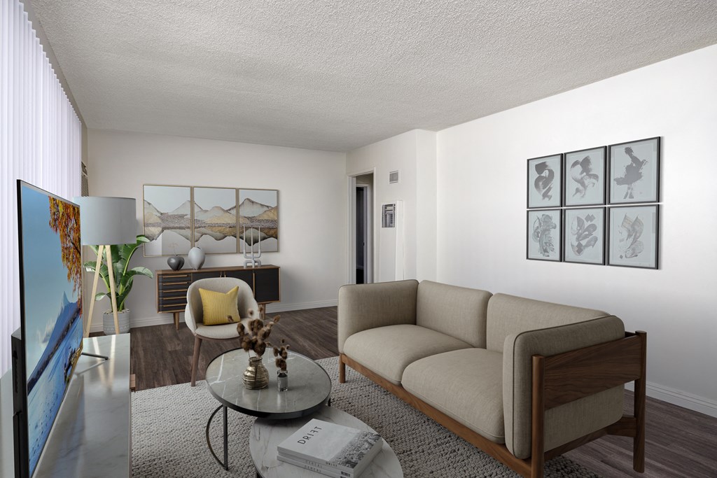 a living room with a couch and a table