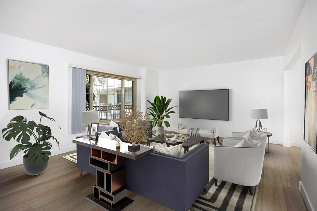 a living room with a couch and a table and a television