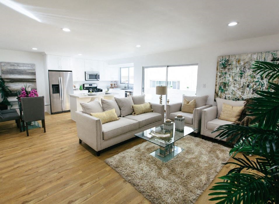 a living room with a couch and a table