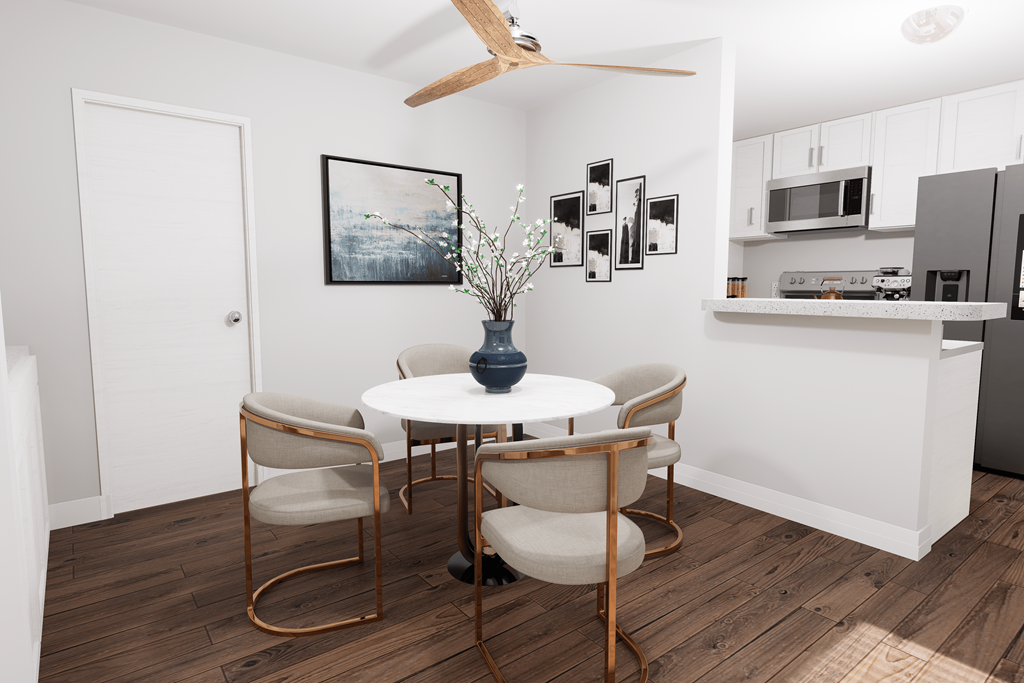 a dining room with a table and four chairs
