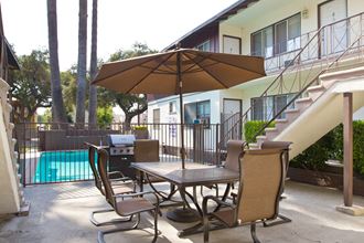 our apartments have a large back yard with a grill and bbq - Photo Gallery