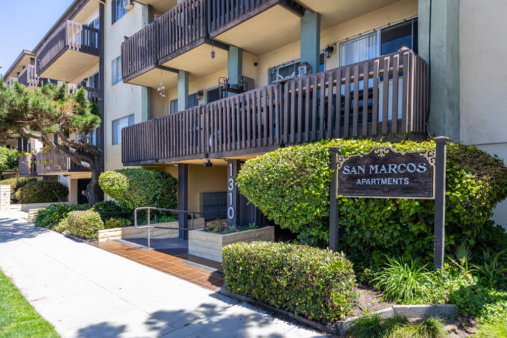 the sign apartments in front of the building