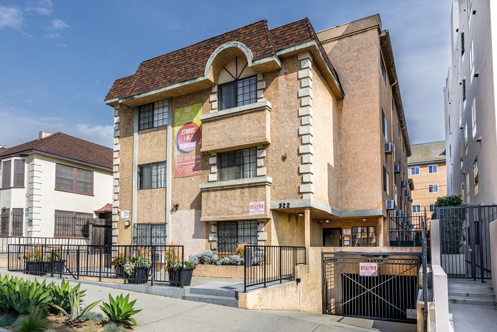a brick building with a sign on the side of it