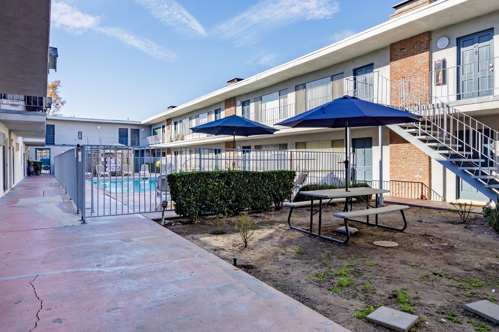 courtyard with tables and umbrellas
