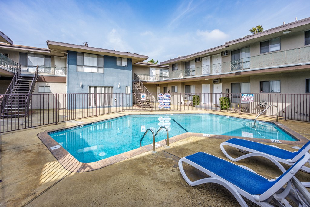 our apartments have a resort style pool with chairs