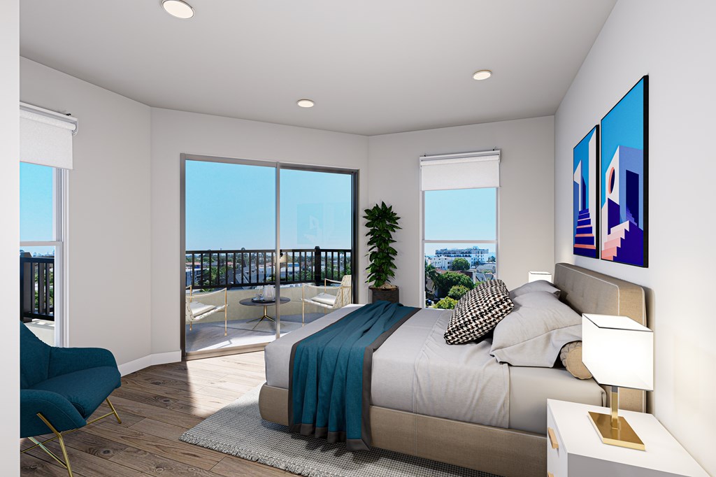 A modern bedroom with a large bed and a view of the city.