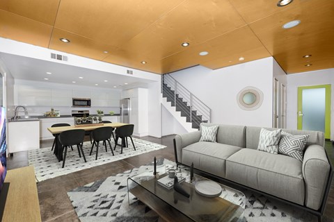 a living room with a couch and a table