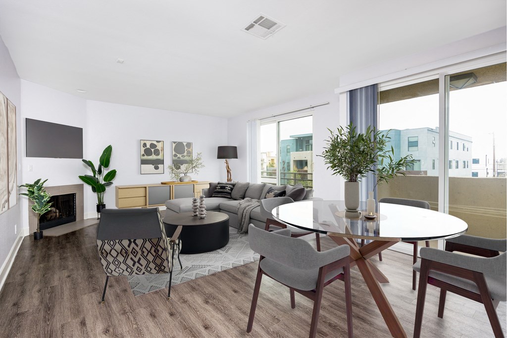 a living room with a round table and a couch