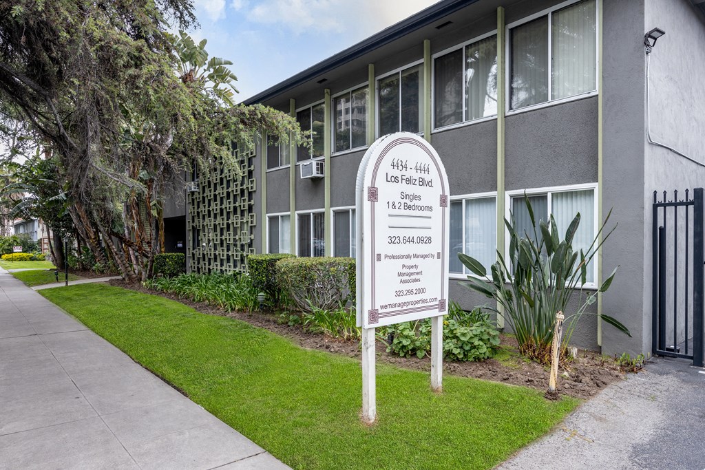 a building with a sign in front of it