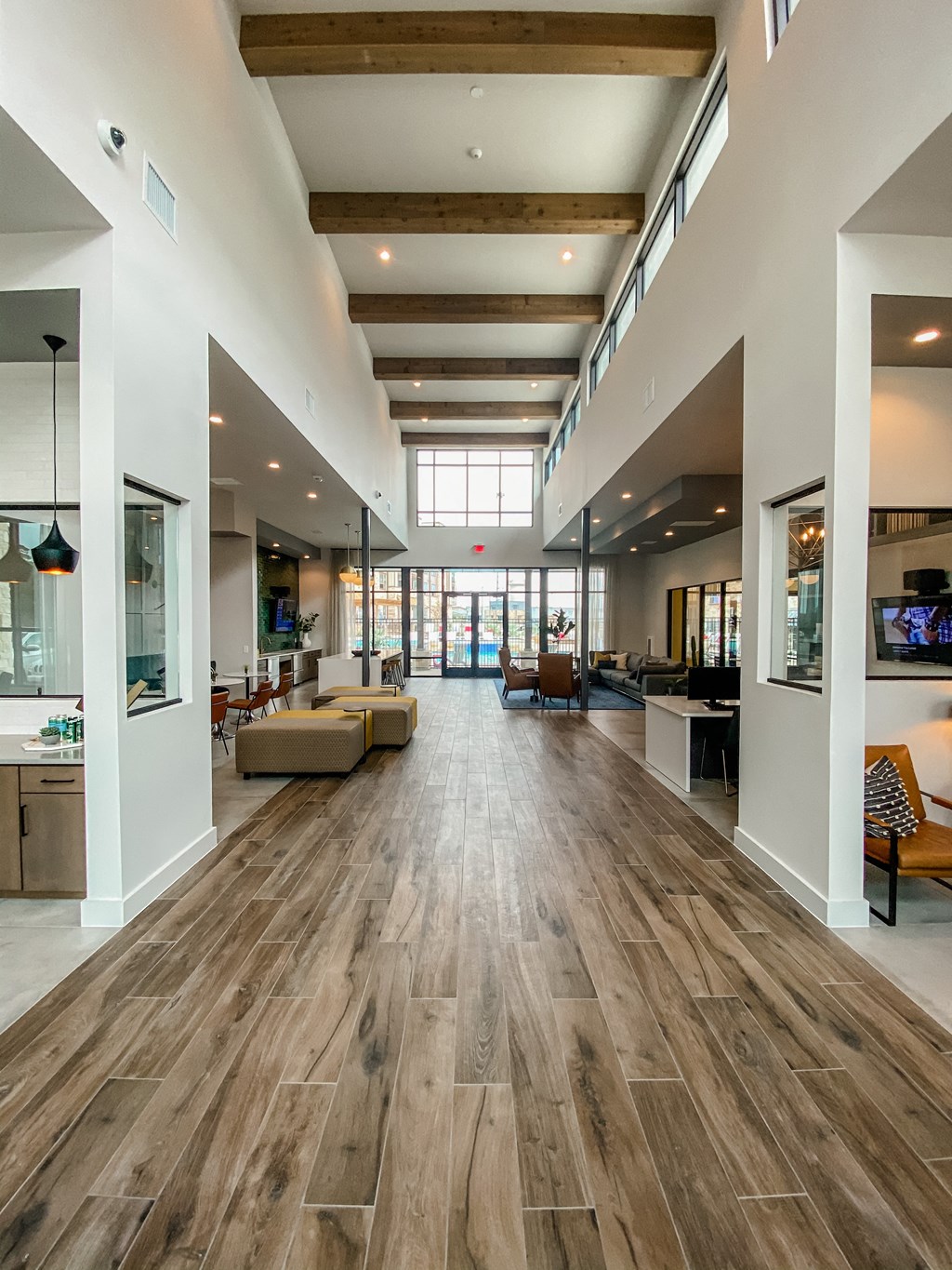 Caprock Crossing Apartments in College Station, TX Clubhouse with seating area and communal kitchen