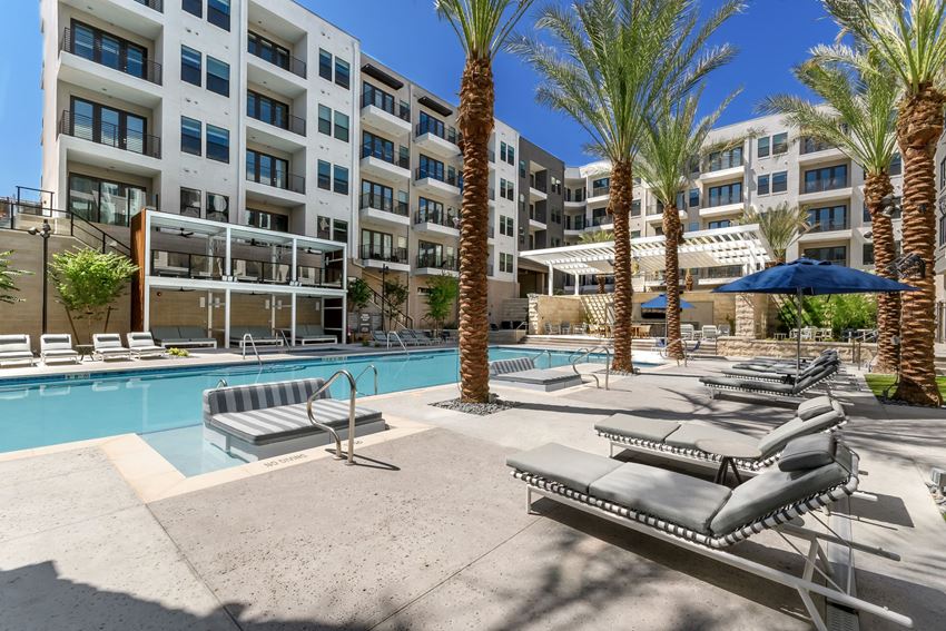 Auric Symphony Park Pool with Loungers