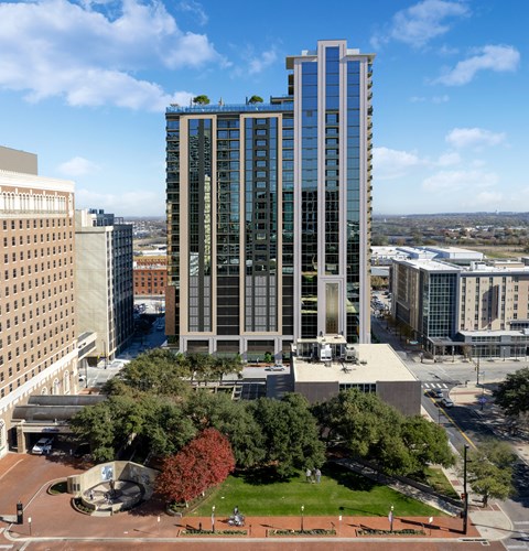 exterior drone image of Deco Apartments