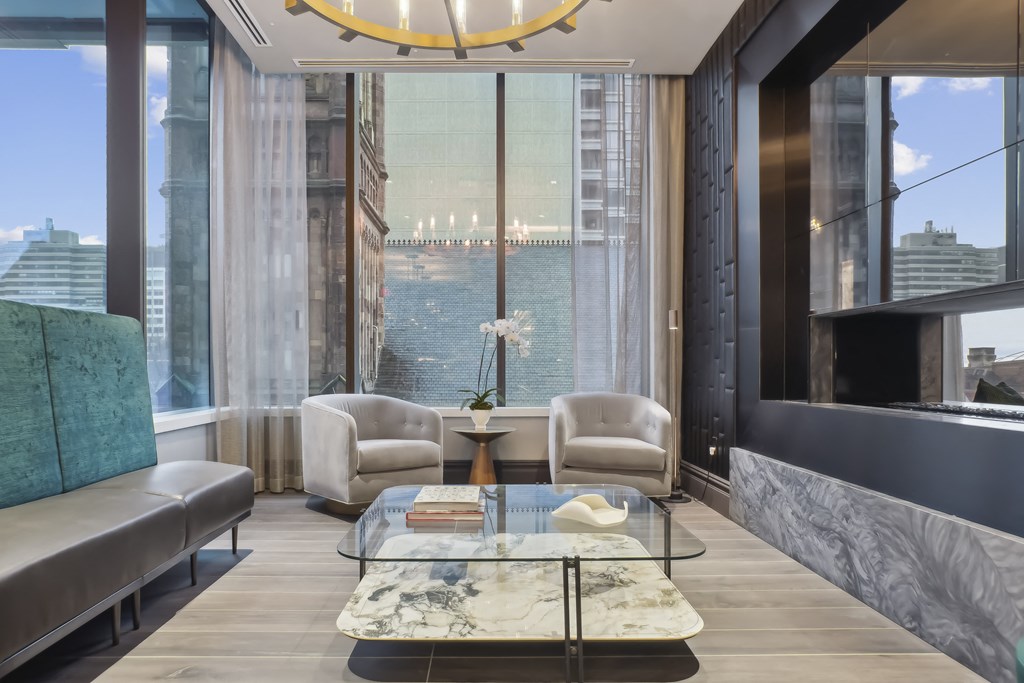 Elegant Duel-Facing Fireplaces and Lounges