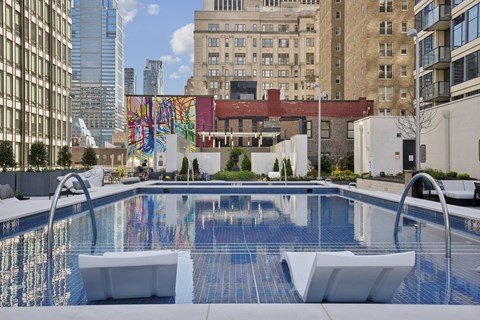 Heated Resort-Inspired Pool with Sun Shelves