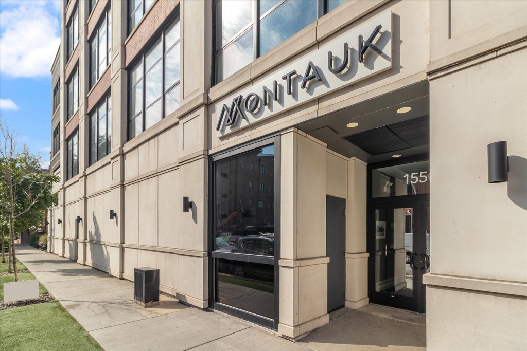 a view of the front of the building from the sidewalk