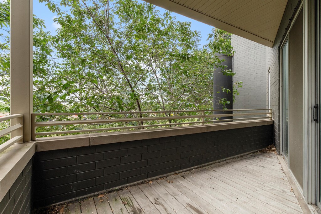 one of two balconies at the whispering winds apartments in pearland, tx