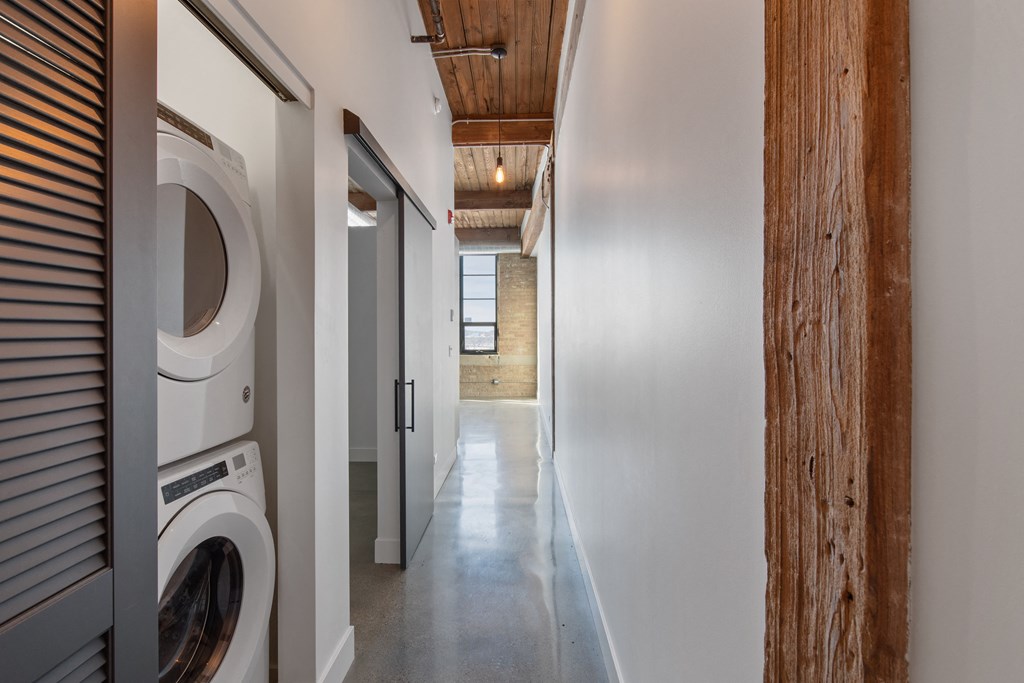 a laundry room with a washer and dryer