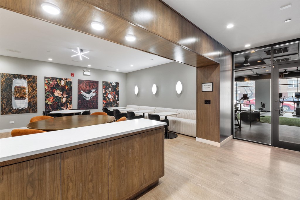 a room with a table and chairs in it