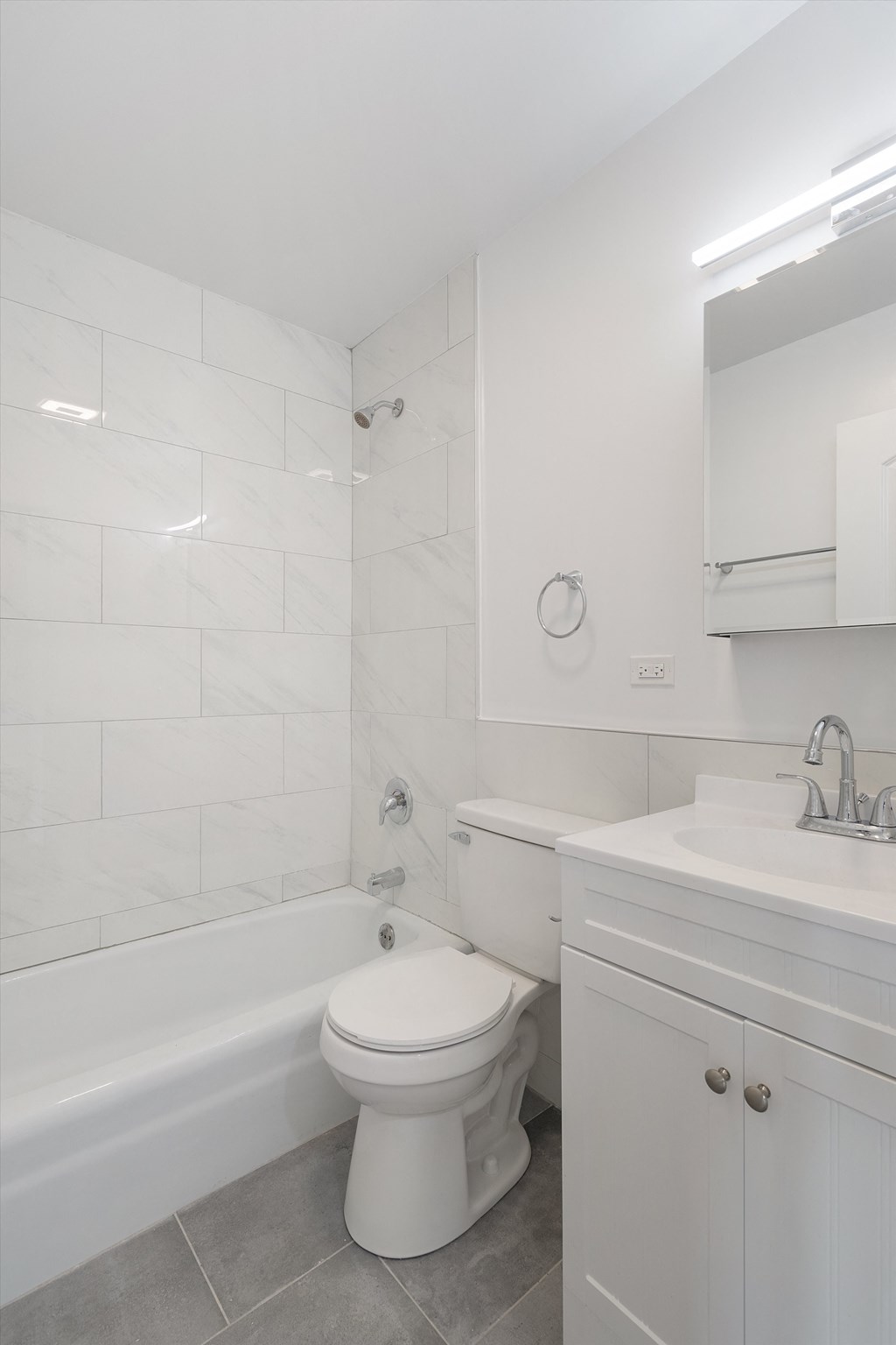 a bathroom with a toilet sink and bathtub