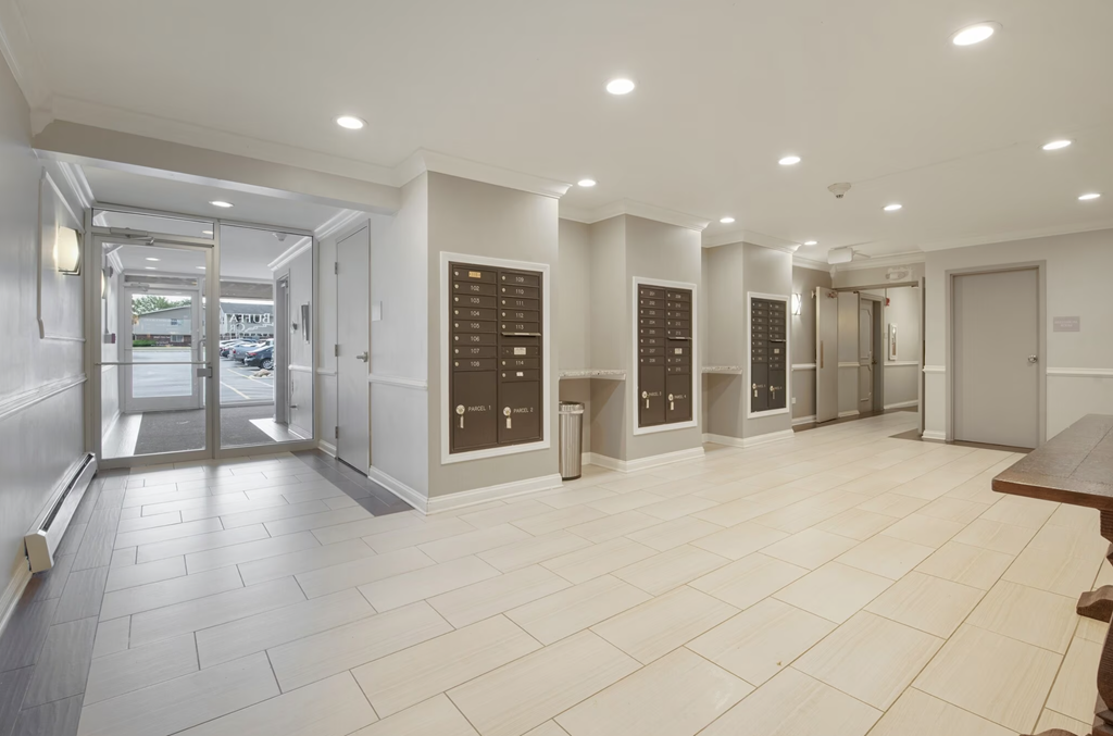 the locker room is equipped with a large selection of lockers