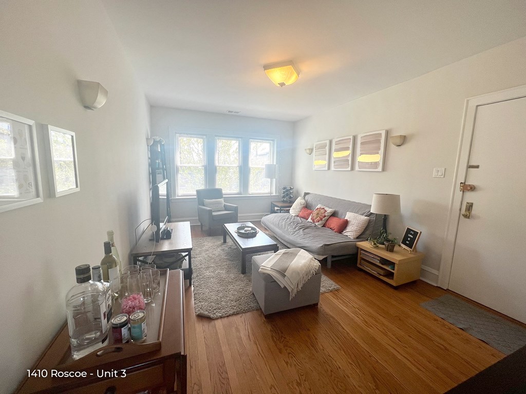 an image of a living room with a couch and a table