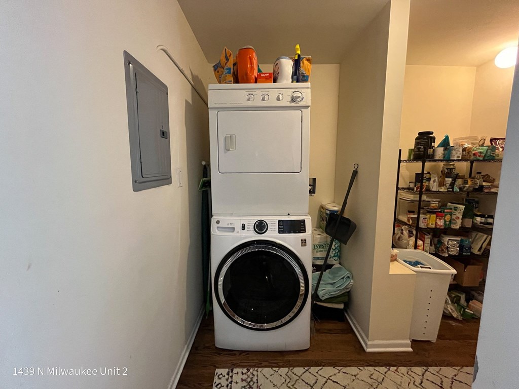 the laundry room has a washer and dryer in it