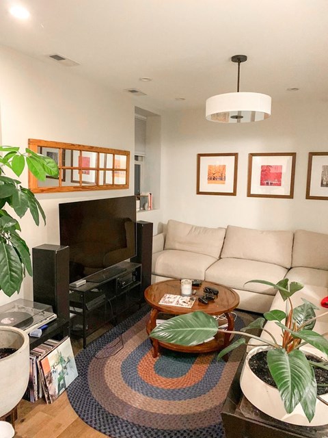 a living room with a couch and a television