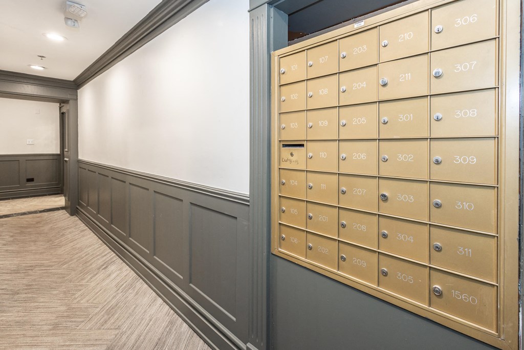 a lockers area in the clubhouse at ascend at woodbury apartments