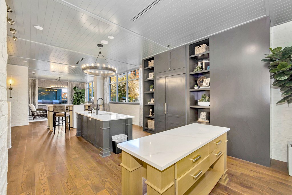 a kitchen with stainless steel appliances and a large island