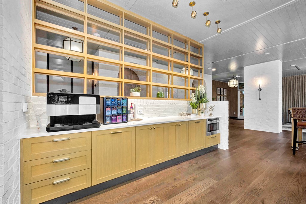 a kitchen with wooden cabinets and a counter top