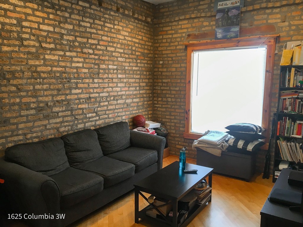 a living room with a couch and a coffee table