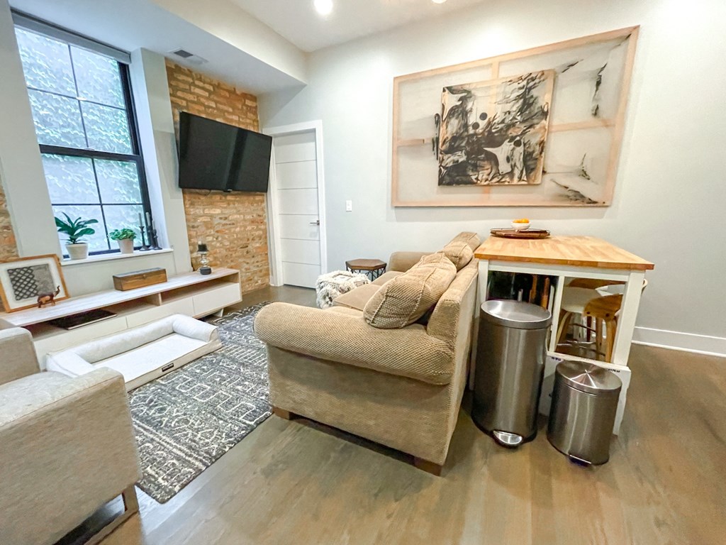 a living room with a couch and a table