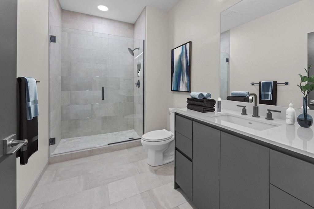 renovated bathroom standing tile shower