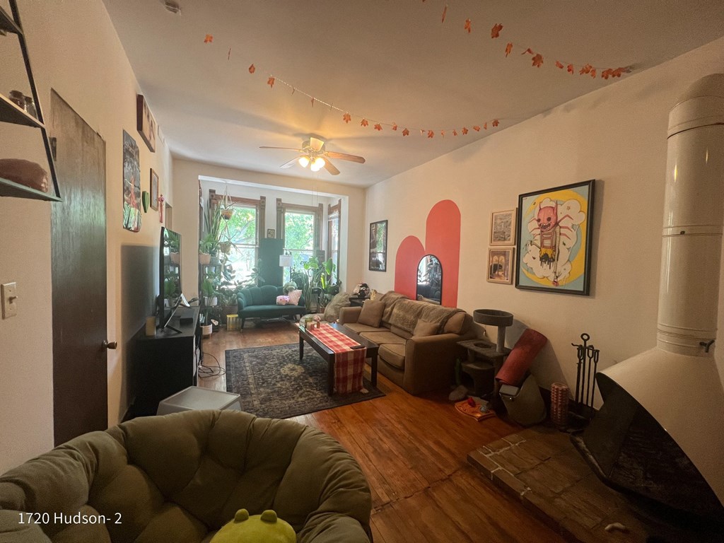 a living room with a couch and a fire place