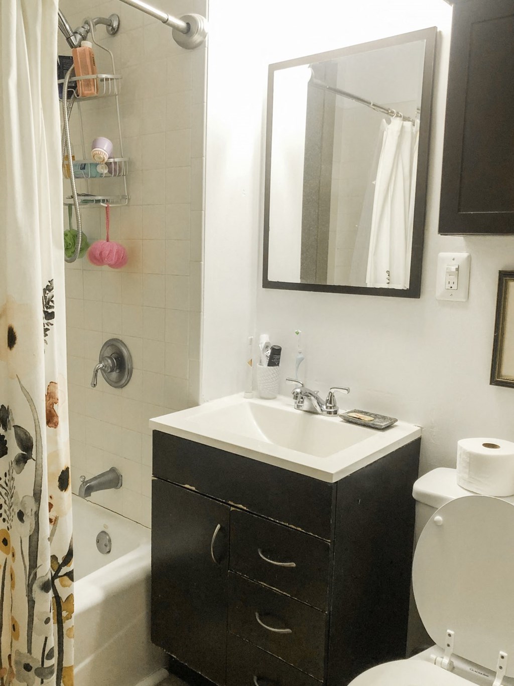 a small bathroom with a sink and a mirror