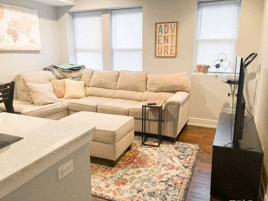 a living room with a couch and a table