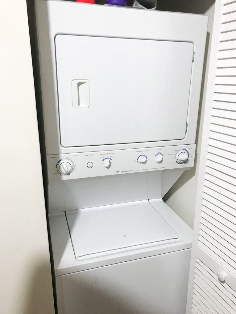 a washer and dryer in a closet