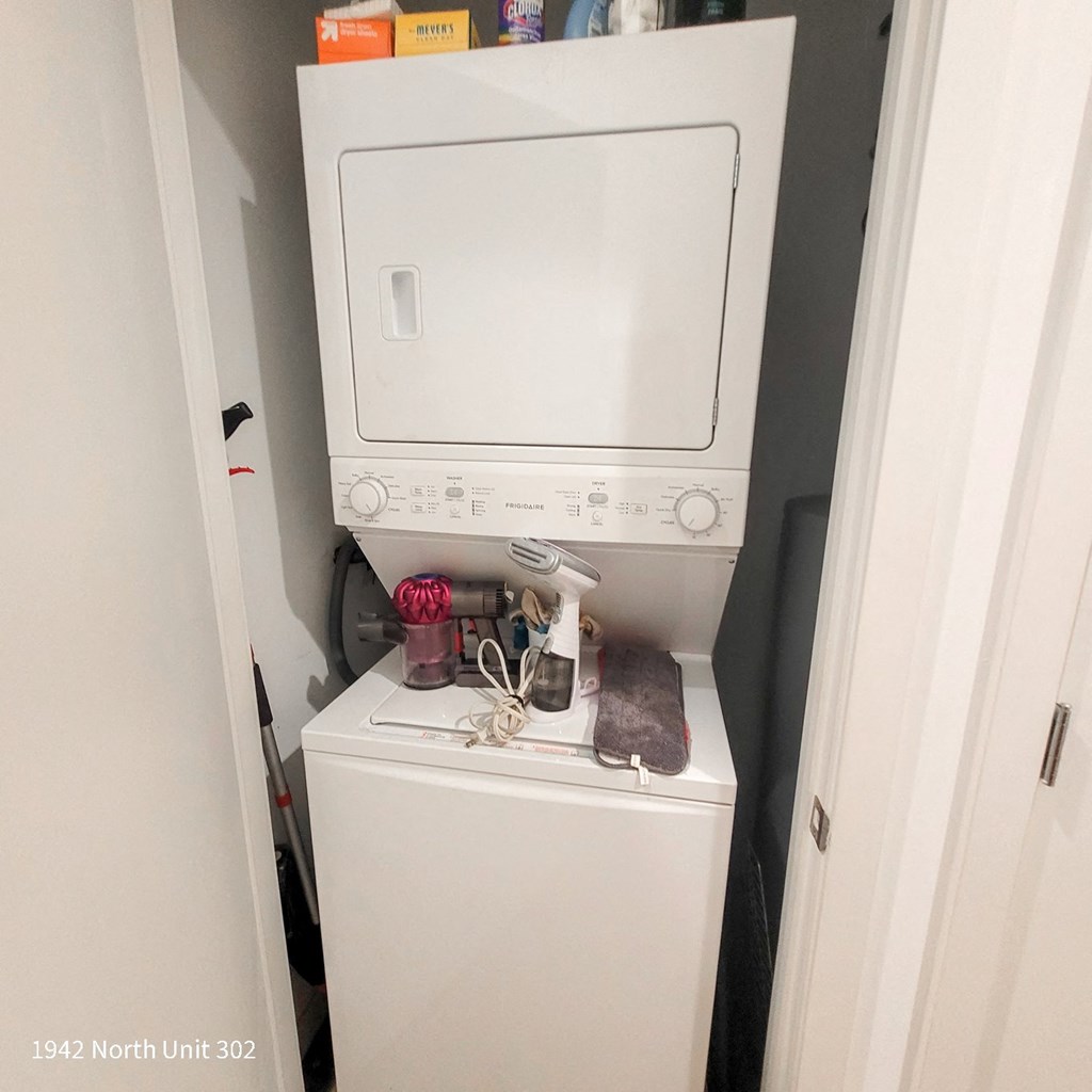 a washer and dryer in a small laundry room