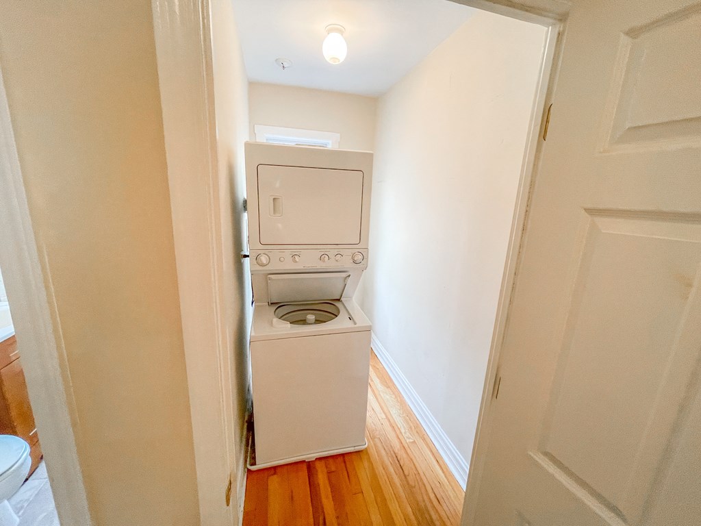 a small laundry room with a washer and dryer