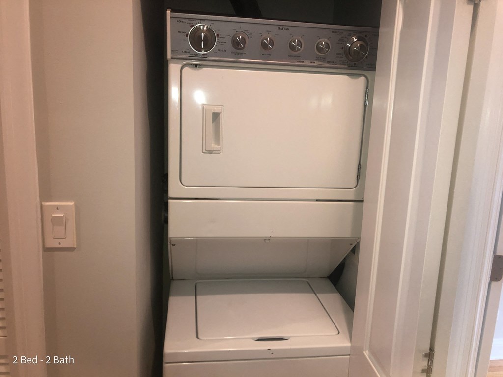 the laundry room has a washer and dryer