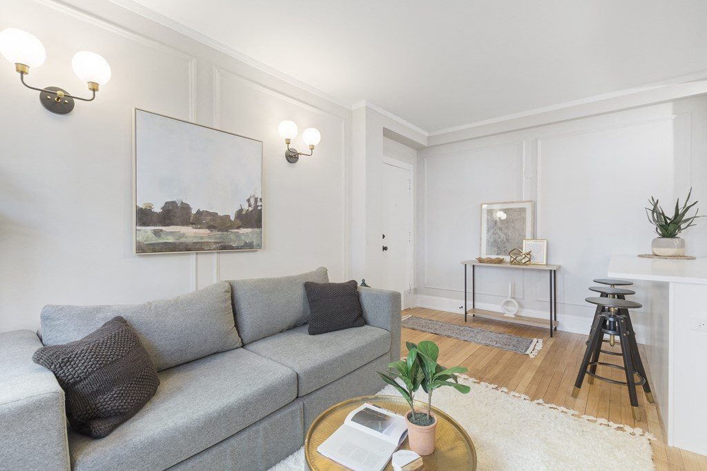 a living room with a couch and a coffee table