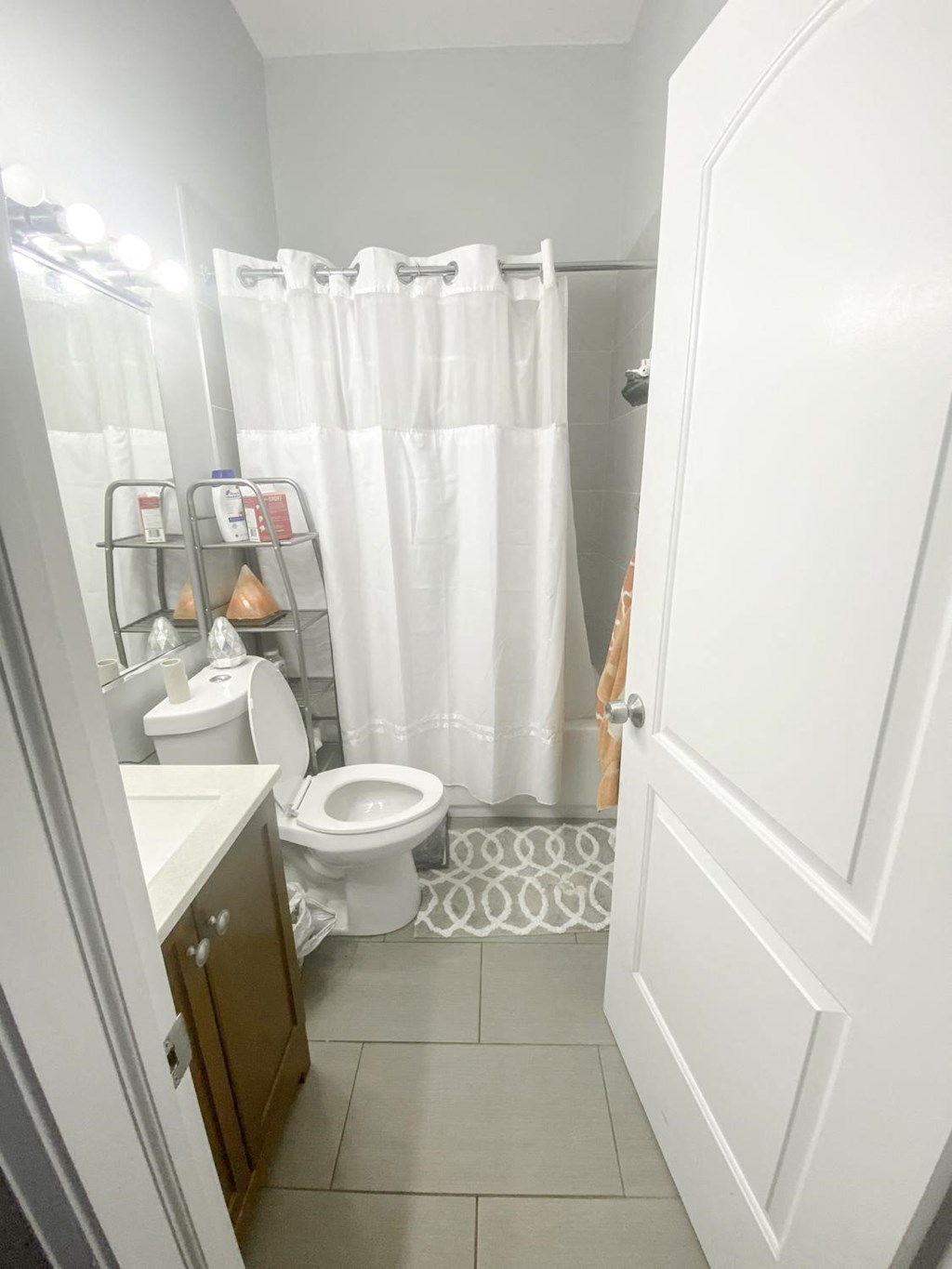 a small bathroom with a toilet and a shower