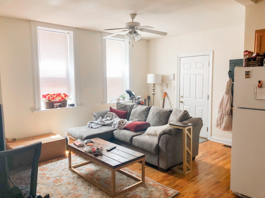 a living room with a couch and a coffee table
