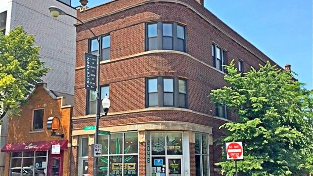 a building on the corner of a city street