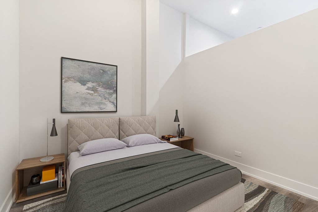 a bedroom with a large bed in a 2317 N Clark